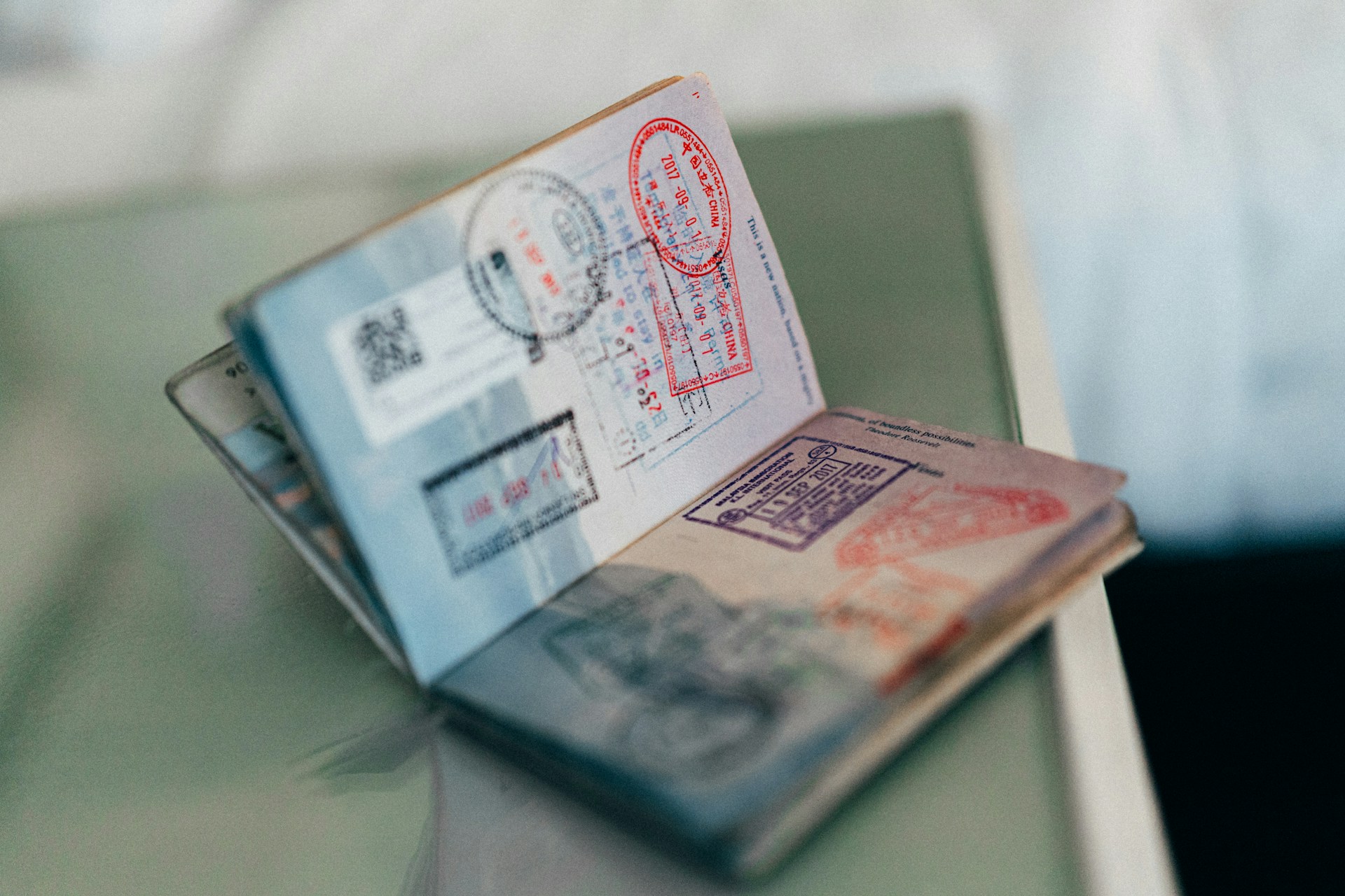 open passport with stamps
